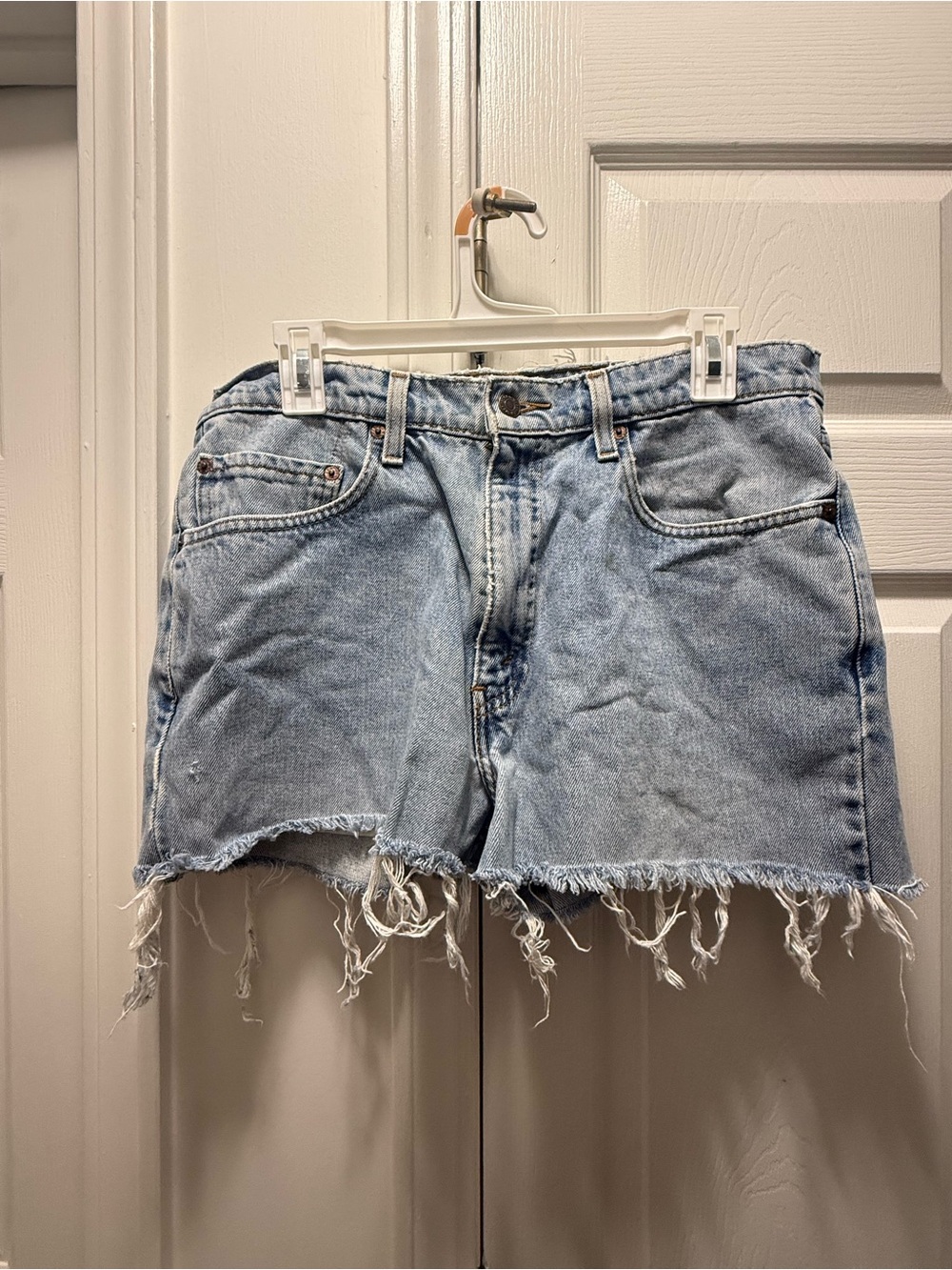 Vintage Levi's Light Wash Frayed Hem Denim Shorts